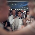 Josh watching Emma dance with her father at their Long Reef Golf Club wedding