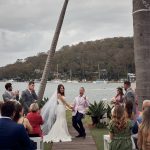 Jennifer and Benny celebrating during their wedding ceremony at Pasadena Sydney in Church Point