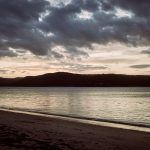 Emma and Luke at sunset by Pittwater during their Palm Beach wedding photography session